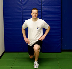 Image of a man lunging with his left leg forward