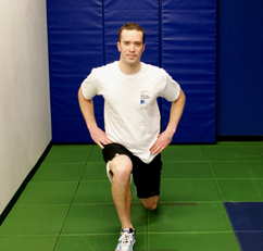 Image of a man lunging with his right leg forward